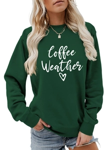 Detail of dark green Coffee Weather sweatshirt with white lettering and heart print