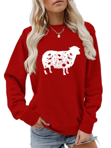 Detail view of red crewneck sweatshirt with white sheep and floral print on chest