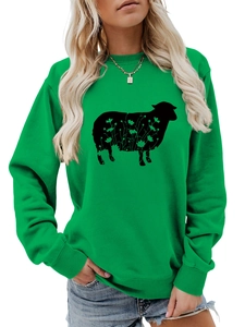 Detail of green crewneck sweatshirt featuring a black sheep silhouette with floral print