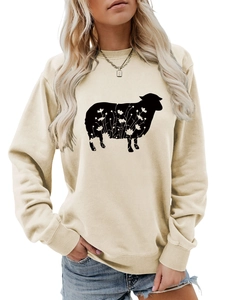 Detail of light beige sweatshirt showing ribbed neckline and black sheep floral print