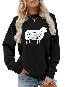 Close-up of black crewneck sweatshirt with white sheep silhouette and floral line art design