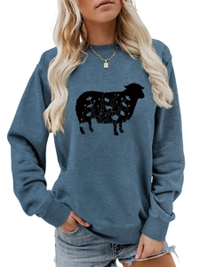 Detail of navy blue crewneck sweatshirt featuring a black sheep silhouette with floral print