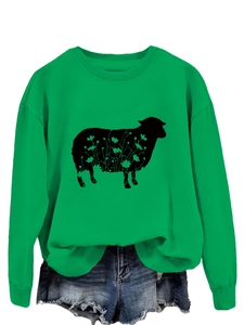 Detail of green crewneck sweatshirt with black sheep silhouette and floral print