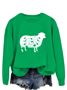 Detail of bright green crewneck sweatshirt with white floral sheep print and ribbed cuffs