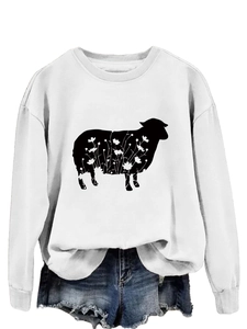 Detail of white crewneck sweatshirt featuring a black floral sheep graphic print