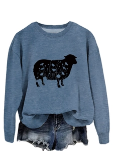 Detailed view of dusty blue crewneck sweatshirt with sheep silhouette and floral pattern
