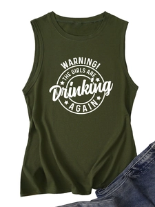 Detail of olive green tank top featuring white graphic print and denim accent