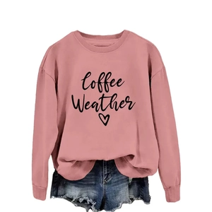 Pink Coffee Weather heart sweatshirt with blue denim shorts on white background