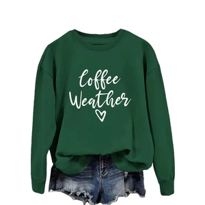 Dark green Coffee Weather sweatshirt paired with distressed blue denim shorts