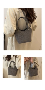 Macro shot of grey leopard bucket bag with knotted handle and FASHINO branding