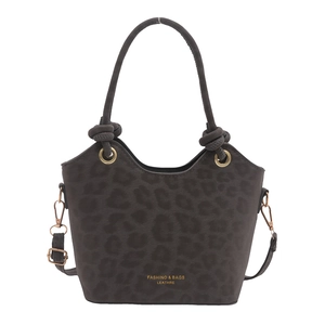 Large leopard print bucket handbag with stylish knotted handle and crossbody strap