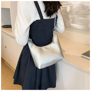 Minimalist silver hobo shoulder bag with metallic lychee texture and sleek strap