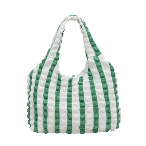 Green and white striped popcorn texture cloud bag with a pleated shoulder strap