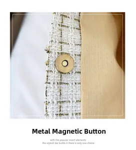 Detaillierte Nahaufnahme eines goldenen Magnetverschlusses an einer weißen Tweed-Tasche
