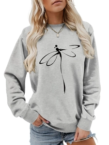 Detail of grey crewneck sweatshirt with minimalist black dragonfly line art on cotton fabric
