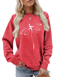 Close-up of red sweatshirt featuring a white dragonfly graphic and ribbed knit cuffs