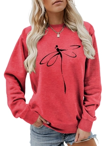 Detail of red crewneck sweatshirt featuring a black abstract dragonfly line art print