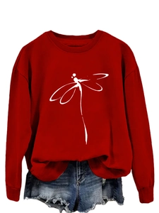 Detail of red crewneck sweatshirt featuring minimalist white dragonfly line art design