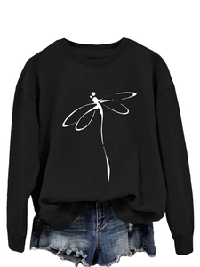 Detail of minimalist white dragonfly print on a black crewneck long sleeve sweatshirt