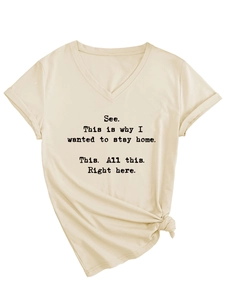 Detail of V-neck beige t-shirt with slogan print, rolled sleeves and stylish front knot