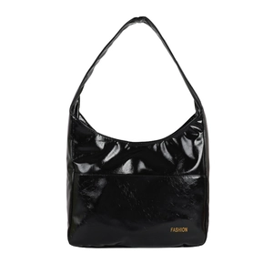 Minimalist black glossy shoulder tote bag with gold lettering on a clean white background