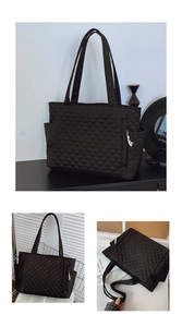 Detail view of large quilted tote bag with side pocket and spacious interior design
