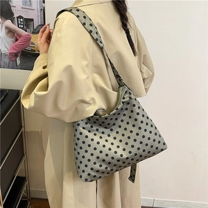 Large capacity grey-green shoulder bag with black polka dots and adjustable strap