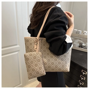 Fashionable beige tote bag set with cross pattern print and matching zipper pouch