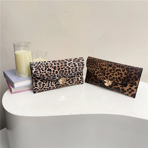 Fashionable leopard print envelope clutch bag with golden triangle metal buckle decoration