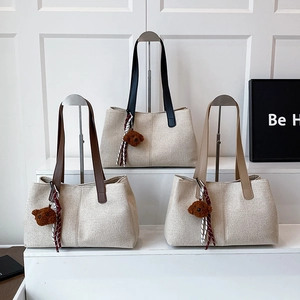 Japanese style canvas tote bags in cream with contrasting straps and cute bear charms