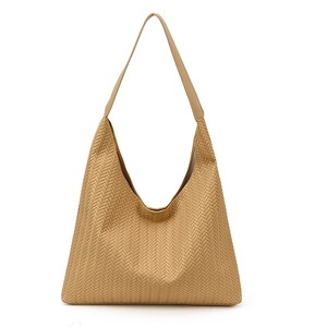 Beige woven texture shoulder tote bag with V-shaped opening and minimalist design