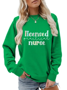 Detailed view of Licensed Practical Nurse artistic lettering on a green crewneck sweatshirt