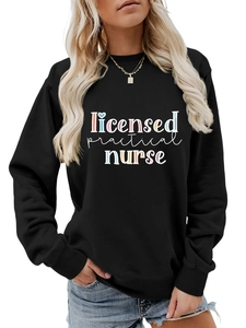 Close-up of black Licensed Practical Nurse print sweatshirt with colorful art typography