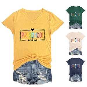 Detail of V-neck cotton T-shirt featuring Preschool Vibes colorful text and heart print