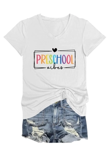 Detail of V-neck white T-shirt with Preschool Vibes print and knotted waist styling