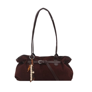 Retro dark brown suede tote bag with leather buckle and beaded charm in front view