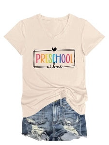 Detail of V-neck preschool vibes T-shirt with knotted hem and distressed denim shorts