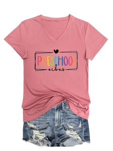 Pink V-neck T-shirt with 'PRESCHOOL vibes' print paired with distressed denim shorts