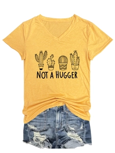 Detail of yellow V-neck T-shirt with cacti print and Not A Hugger text for women