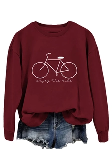 Detail of burgundy crewneck sweatshirt with bike graphic and enjoy the ride text