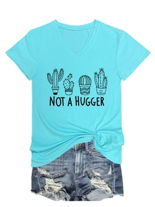Close-up of V-neck light blue T-shirt featuring cactus prints and Not A Hugger text