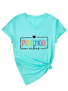 Close-up of V-neck mint t-shirt with Preschool Vibes print and stylish knotted hem detail
