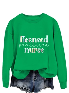 Detail of a bright green sweatshirt with colorful Licensed Practical Nurse text design