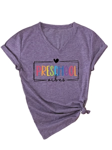 Detail of V-neck heather purple T-shirt featuring preschool vibes print and knotted hem