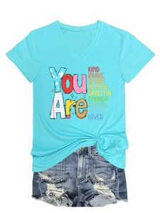 Detail view of light blue V-neck t-shirt with colorful inspirational letter print design