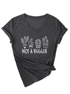 Close-up of Not A Hugger cactus print and V-neck detail on charcoal grey cotton t-shirt