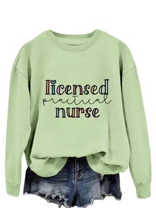 Close-up of Licensed Practical Nurse print on light green long sleeve sweatshirt
