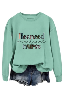 Detail of mint green licensed practical nurse sweatshirt with denim shorts on white background