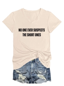 Detail of V-neck T-shirt with letter print and distressed denim shorts with frayed edges