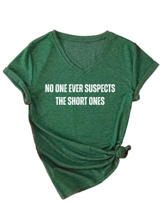 Detail of V-neck dark green t-shirt with side-knot hem and white slogan print